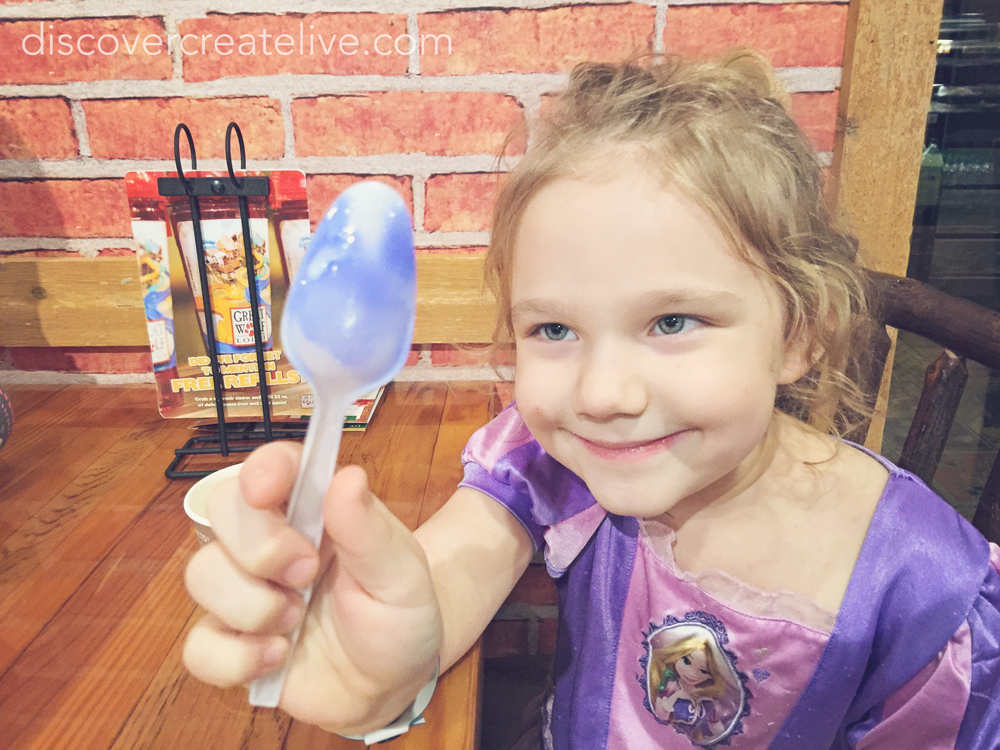 the cold ice cream turned their  spoons blue!