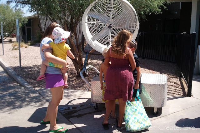 waiting in line... thankful for the fan! {104 at 10am}