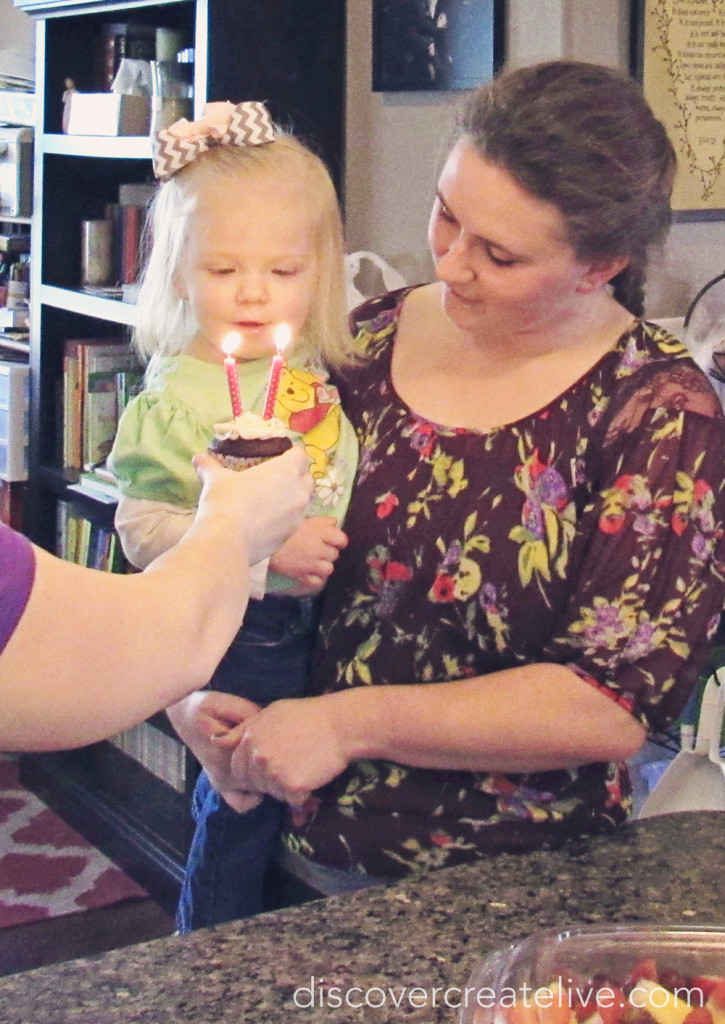 Aunt Jaci helping blow out the candles