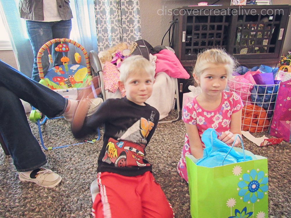 cousins are great for helping open presents